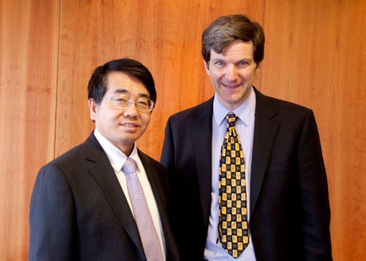 Professor Wei Huang with Professor Ifor Samuel during the visit.